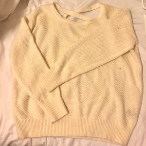 cream sweaters